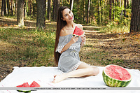 Leona mia top model leona mia bares her petite body and pink pussy as she eats her watermelon.